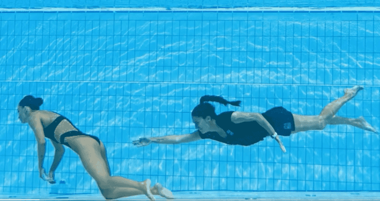 WATCH: Incredible moment coach saves swimmer as she faints underwater WATCH: Incredible moment coach saves swimmer as she faints underwater