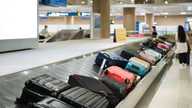 Baggage handler issues warning to people who tie ribbons onto their suitcases
