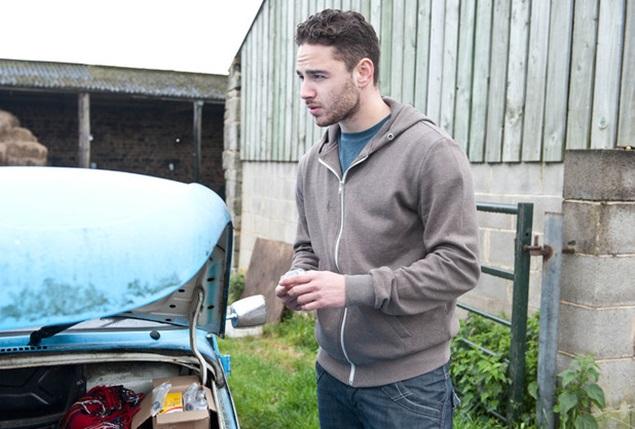 Soap Star Shows Off New Arrival on Magazine Cover